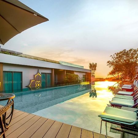 Fusion Suites Phuket Patong Экстерьер фото The pool at the hotel