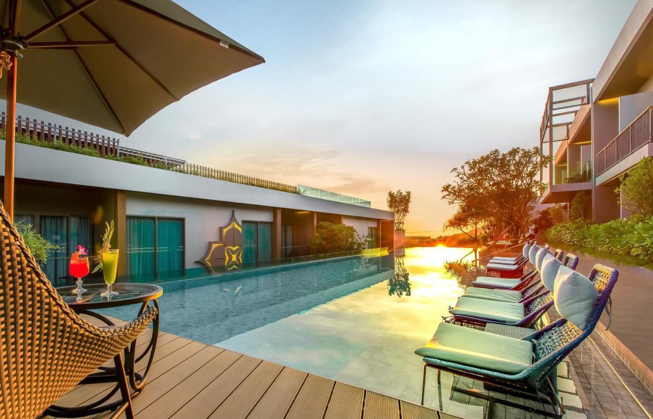 Fusion Suites Phuket Patong Экстерьер фото The pool at the hotel