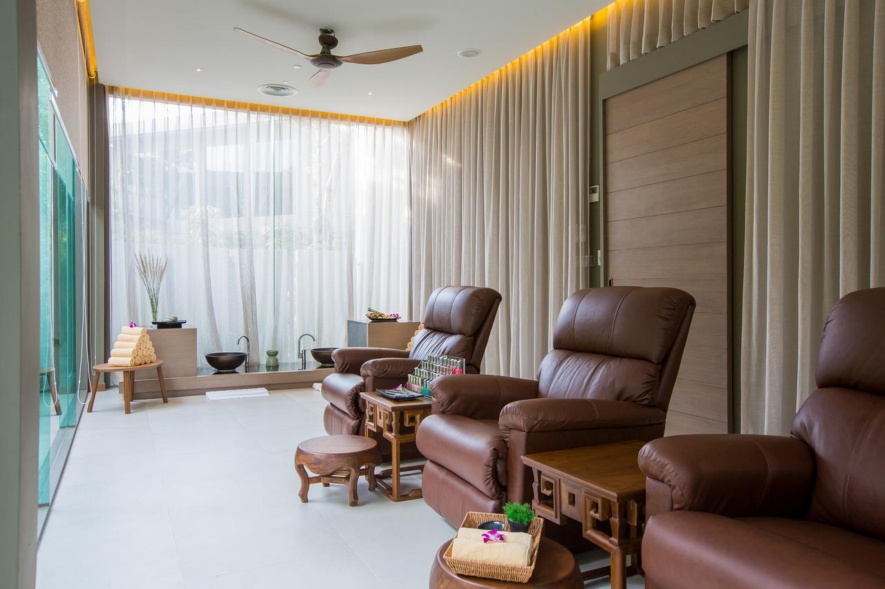 Fusion Suites Phuket Patong Экстерьер фото A foot reflexology room at a spa