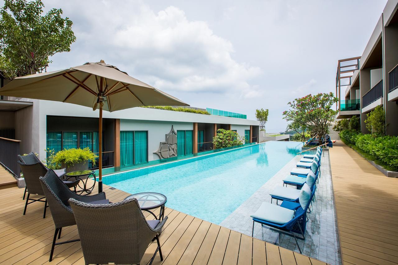 Fusion Suites Phuket Patong Экстерьер фото The swimming pool at the hotel